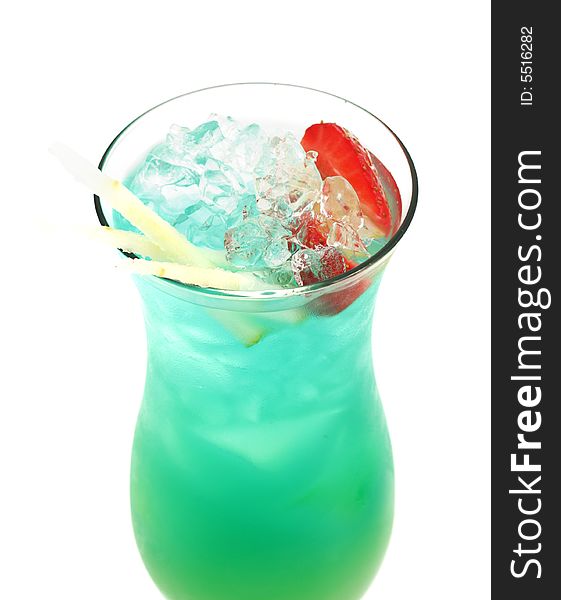 Tropical Acoholic Drink Made of Rum, Pineapple Juice, Blue Curacao, Sweet and Sour Mix. Slice of Apple and Strawberry as a Garnish. Tropical Acoholic Drink Made of Rum, Pineapple Juice, Blue Curacao, Sweet and Sour Mix. Slice of Apple and Strawberry as a Garnish.