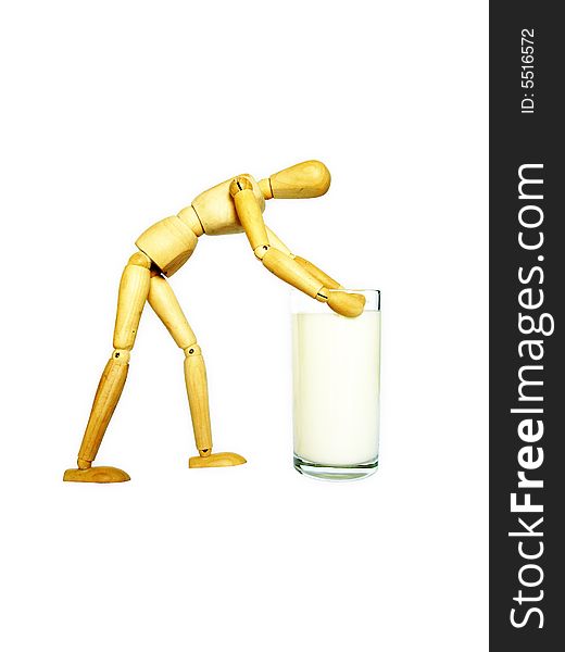 Wooden toy and glass of milk on white background