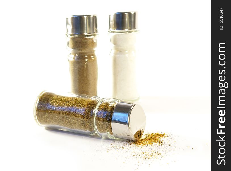 Salt and pepper shakers on a white background. Salt and pepper shakers on a white background.