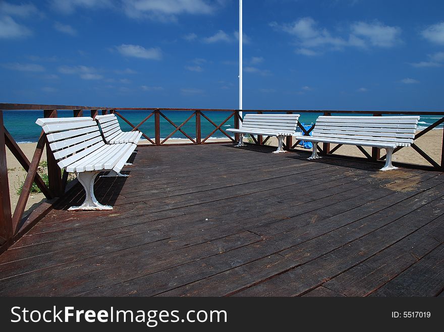 Bench on marine beach in city nagariya