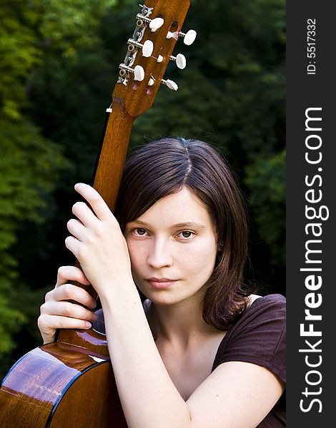 Young Woman With Guitar