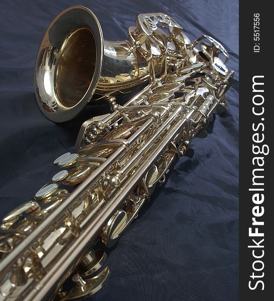 Saxophone detail on a black background. Saxophone detail on a black background