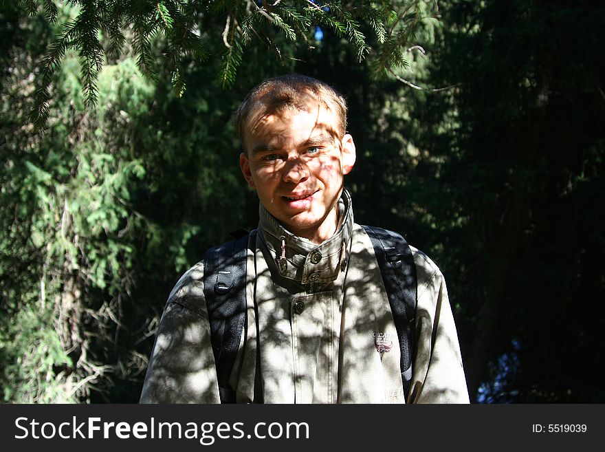 Portrait of young men tourist with patern of shadow on face. Portrait of young men tourist with patern of shadow on face