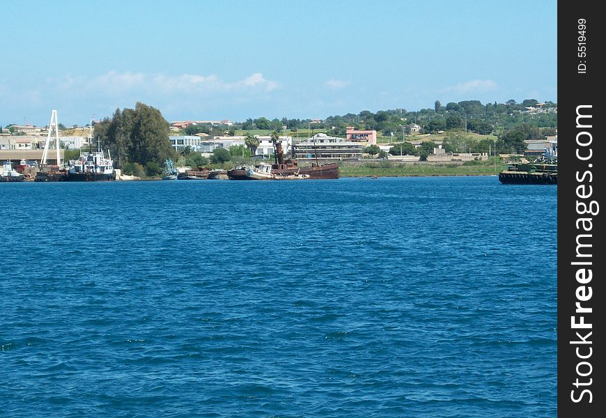 This is a photo of some wrecks in the port of August (Sicily)