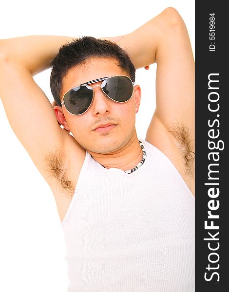 Handsome young man in sleeveless undershirt and sunglasses. isolated on white background. Handsome young man in sleeveless undershirt and sunglasses. isolated on white background