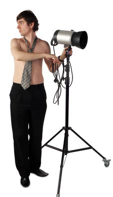 Young Man Working With A Lighter Stock Image Young Man Working With A Lighter Stock Image