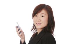 Asian Businesswoman With Mobile Phone Stock Photos