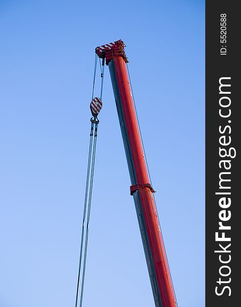 Crane in front of blue sky