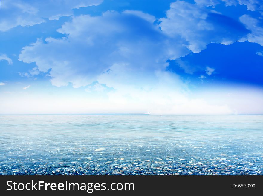 Wave on sea beach under year blue sky and cloud