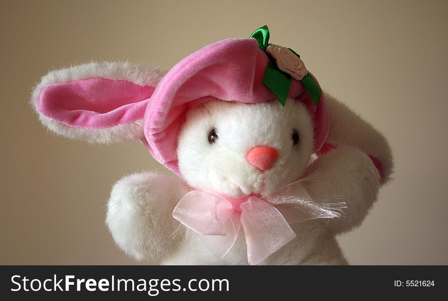 Rabbit toy in pink hat