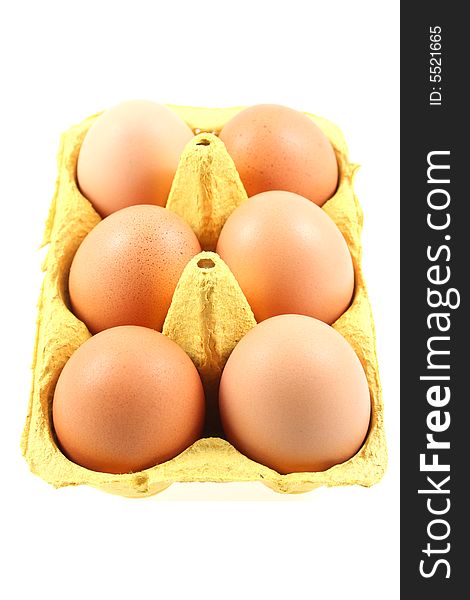 Brown Eggs In Yellow Box