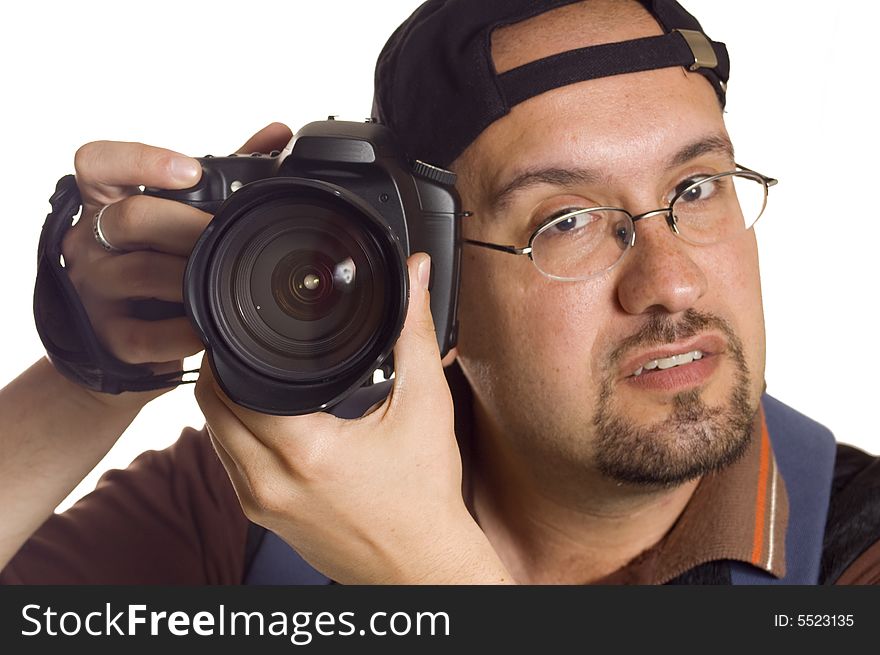 Young man with digital camera taking picture, focus on lens. Young man with digital camera taking picture, focus on lens