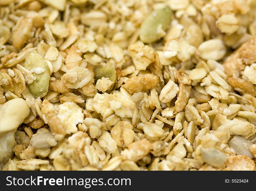 Close-up of organic granola cereal with rolled oats.