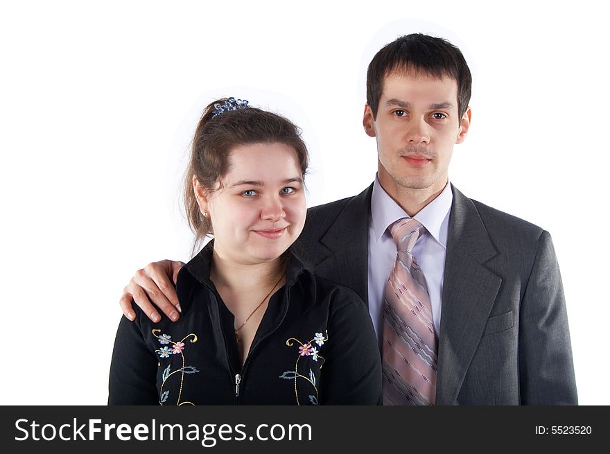 Girl with young man in suit isolated on white