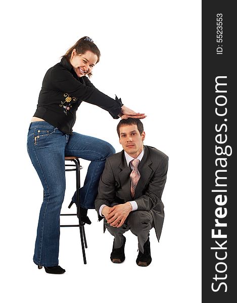 Girl's pressure on man sitting at her stool. Girl's pressure on man sitting at her stool