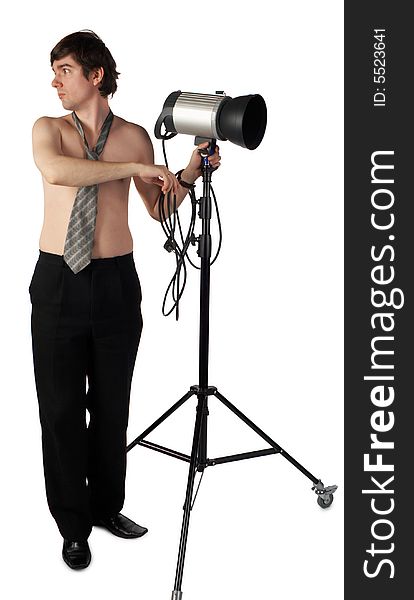 Young man working with a lighter isolated on white