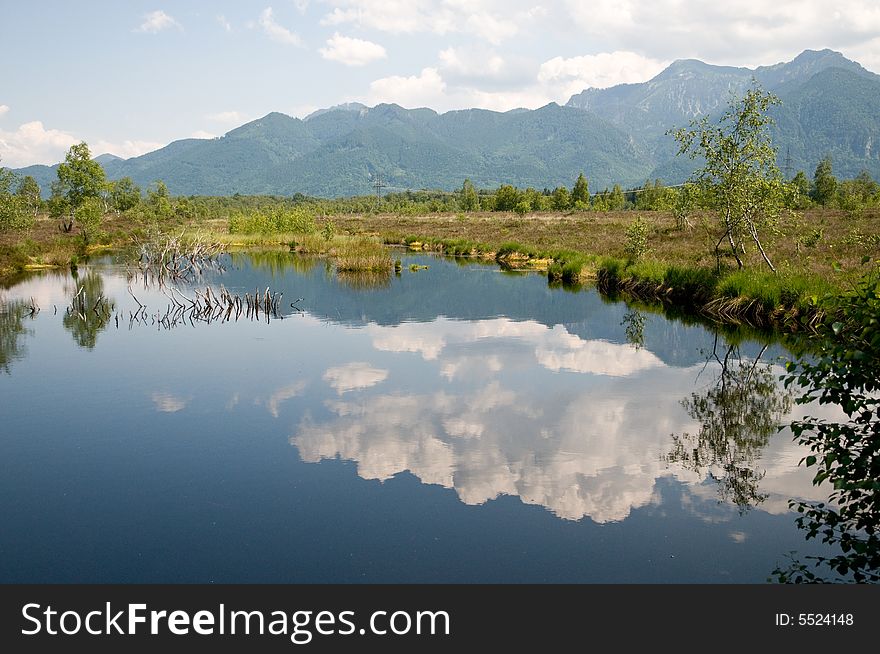 Turf moor landscape in the bavarian foothills of the alps near Chiemsee
the lake is the result of cutting peat. Turf moor landscape in the bavarian foothills of the alps near Chiemsee
the lake is the result of cutting peat