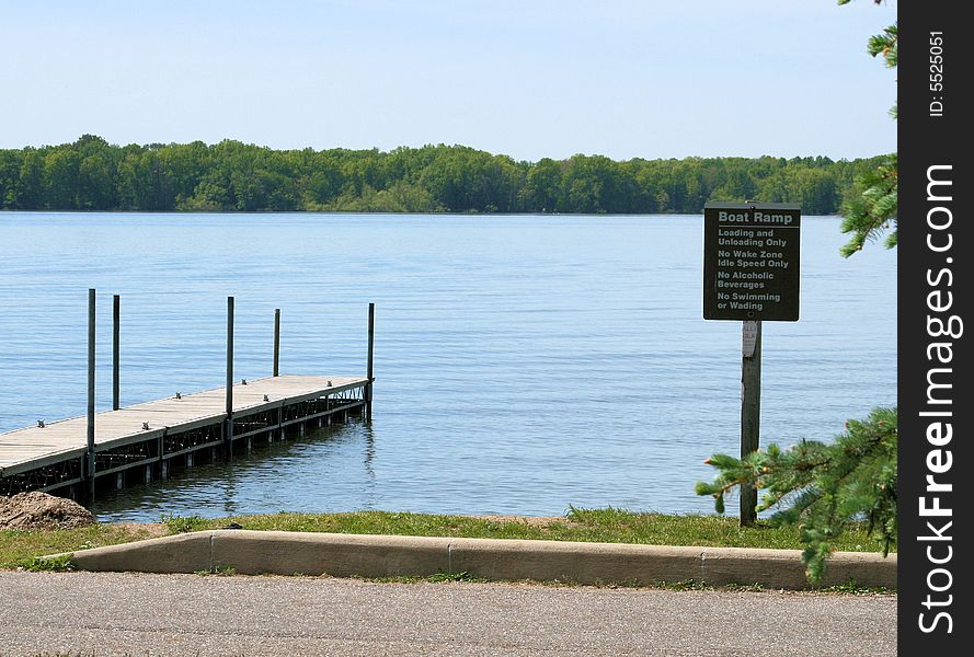 Boat Dock and Sign at the Lake