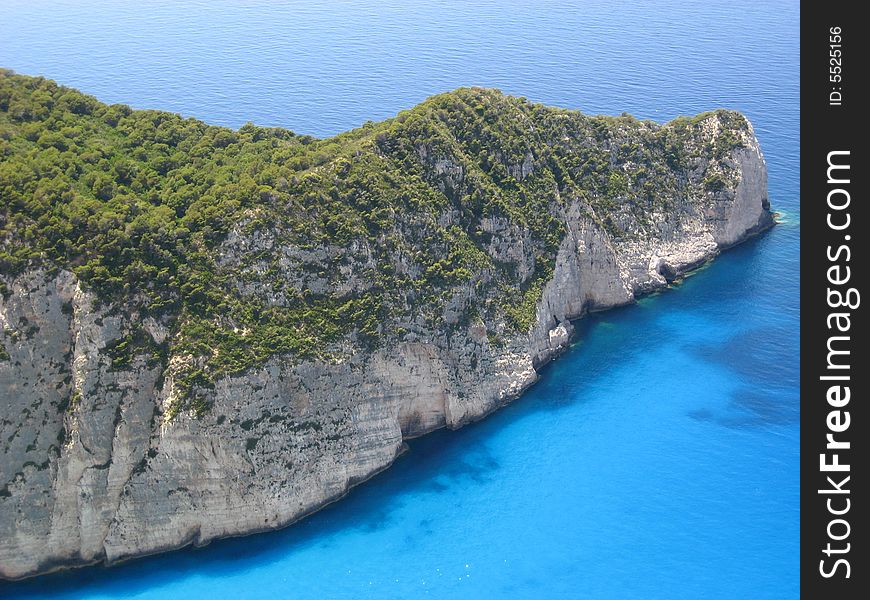 A mountin at the greek cost with lovely blue water. A mountin at the greek cost with lovely blue water