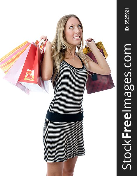 Happy Young woman holding bags on a white background