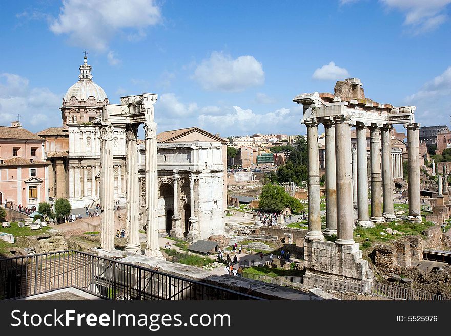 Roman Forum in Rome, Italy, with a blue sky background