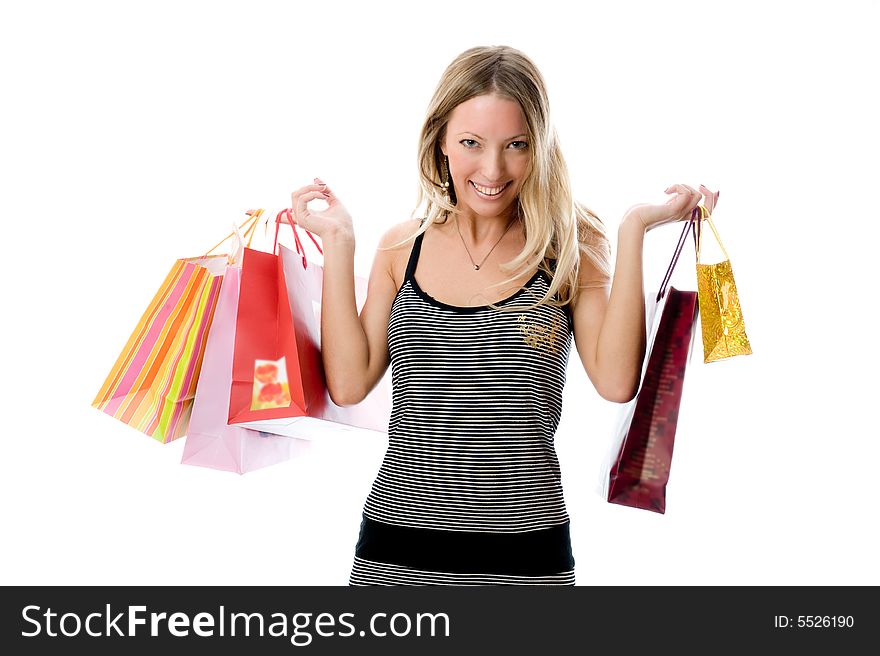 Happy Young woman holding bags on a white background