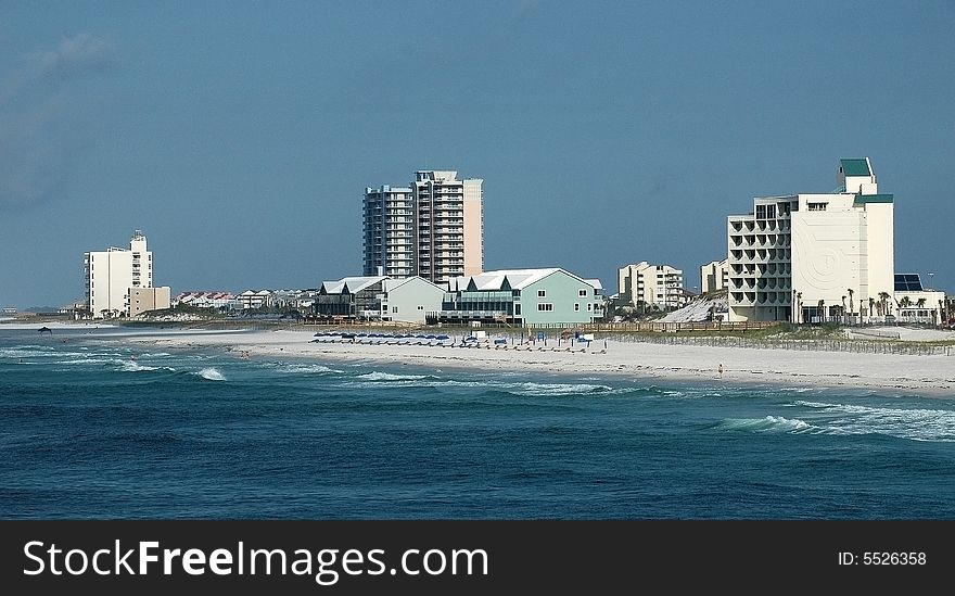 Beach resort skyline with buildings, water and sand. Beach resort skyline with buildings, water and sand