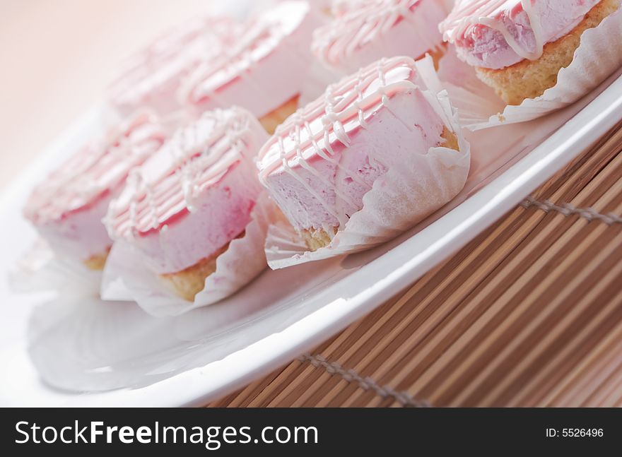 Small cakes on white plate