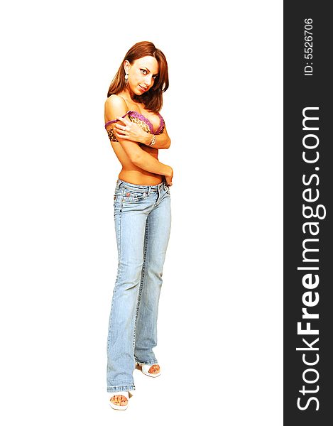 An very fit woman in jeans and brown bra standing in an studio 
for white background and shooing her great figure. An very fit woman in jeans and brown bra standing in an studio 
for white background and shooing her great figure.