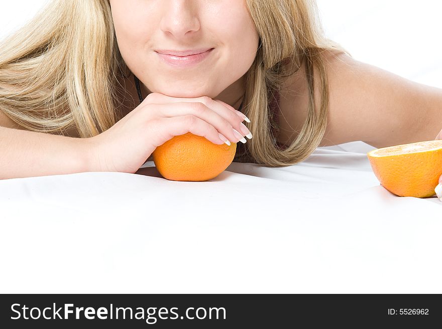 Closeup portrait of young woman with two orange