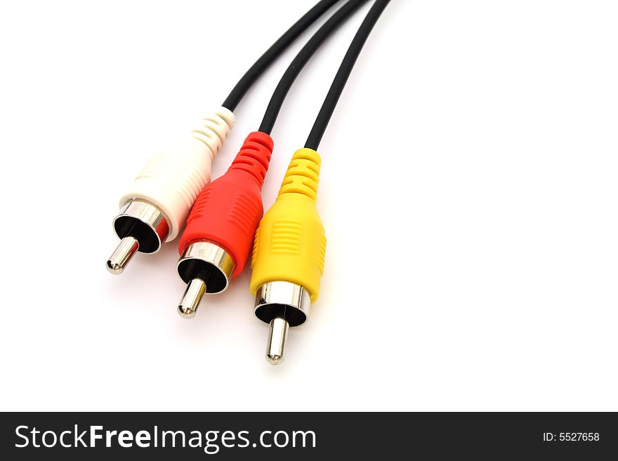 Audio and video cables over a white surface