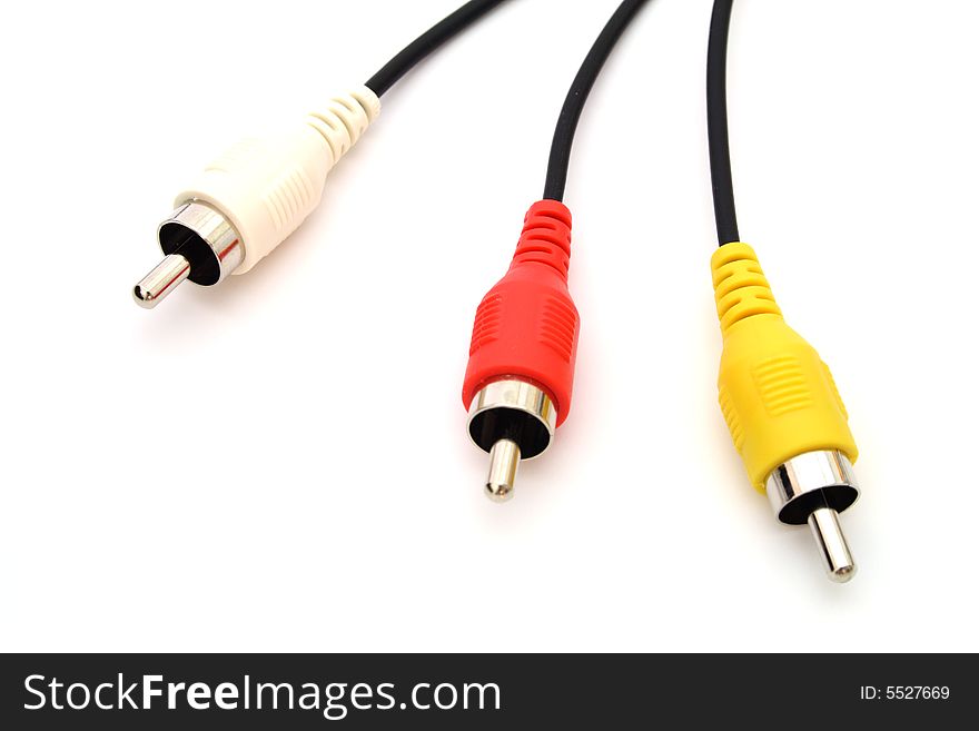 Audio and video cables over a white surface