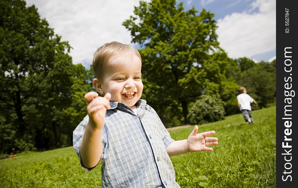 Brothers. Young Boys Playing Outdoors.