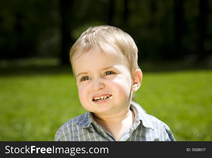 Young Kid After Lunch Walking In The Park