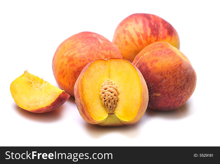 Fresh peachs on white background