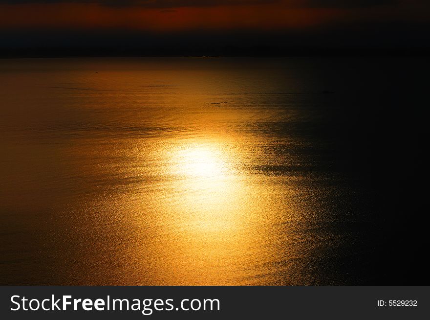 Water reflections of the evening sun. Water reflections of the evening sun