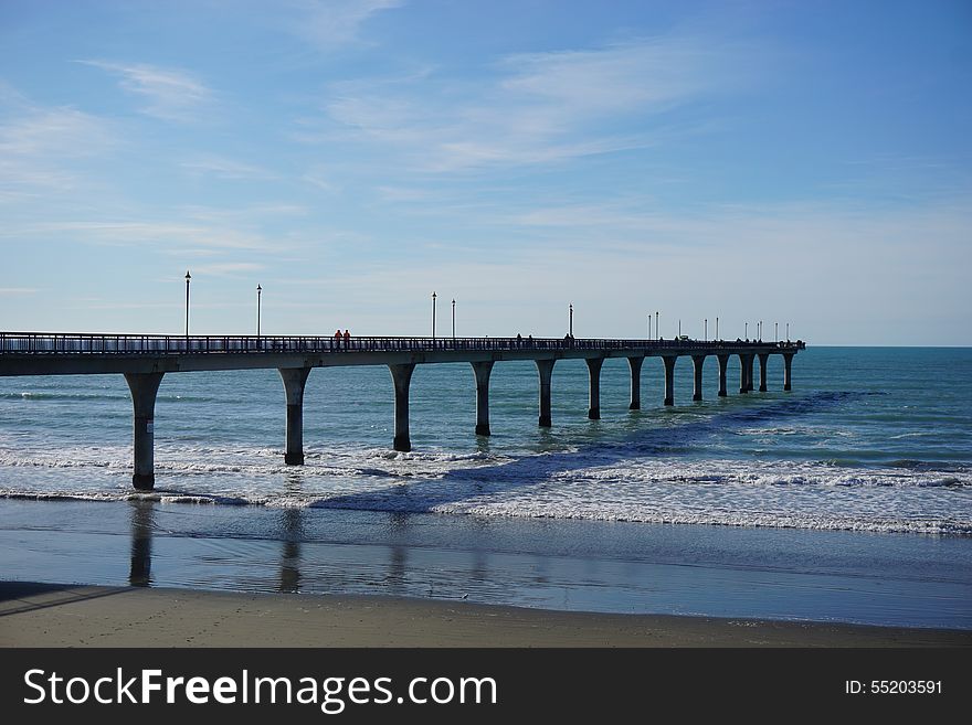 Pier at shores of Southern Pacific ocean, Christchurch. Pier at shores of Southern Pacific ocean, Christchurch