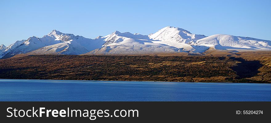 Snow covered mountain range in southern New Zealand, Lake Pukaki. Snow covered mountain range in southern New Zealand, Lake Pukaki