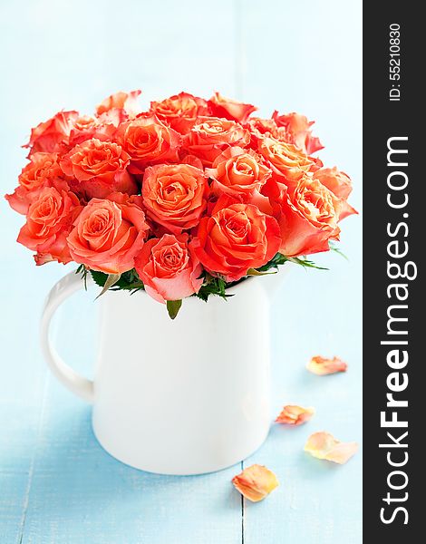 Bouquet of roses in a cup, selective focus