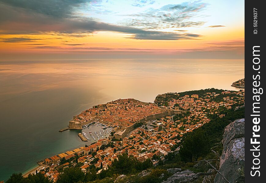 View of Dubrovnik, beautiful fortress medieval town in Croatia, Europe, moments before sunrise. View of Dubrovnik, beautiful fortress medieval town in Croatia, Europe, moments before sunrise.