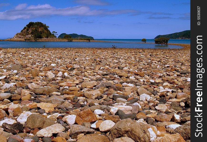 View to sea accross a pebbel beach at Whitsundays Islands. View to sea accross a pebbel beach at Whitsundays Islands.