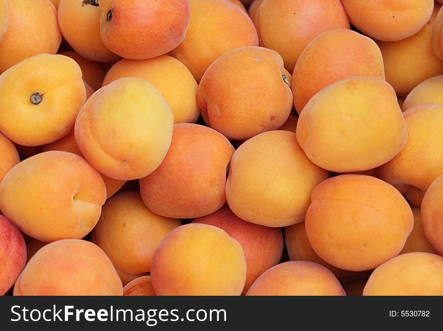 Fresh apricot heap - natural background. Fresh apricot heap - natural background