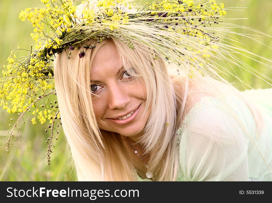 Sexy caucasian girl with flower garland