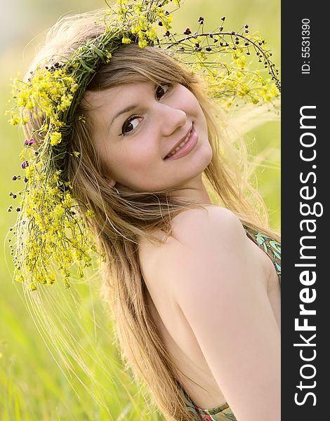 caucasian girl with flower garland