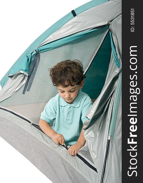 Young boy in a tent