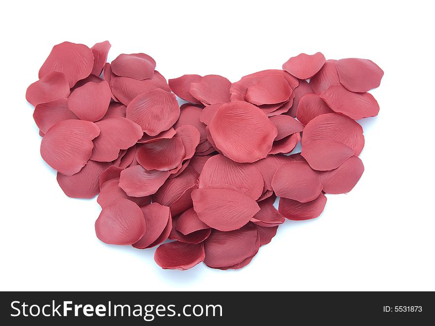 Dispersed rose petal compose heart shape. Dispersed rose petal compose heart shape