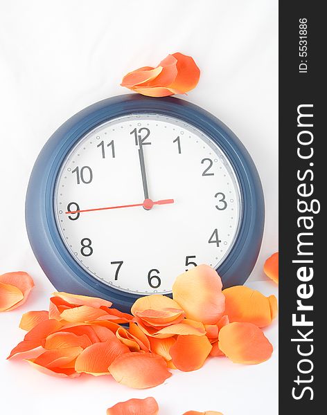 A simple clock with orange and red petal around, featuring the treasury time. A simple clock with orange and red petal around, featuring the treasury time.