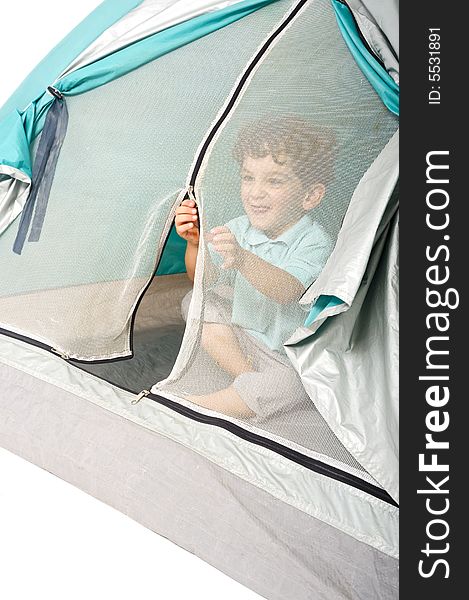 Young boy in a tent