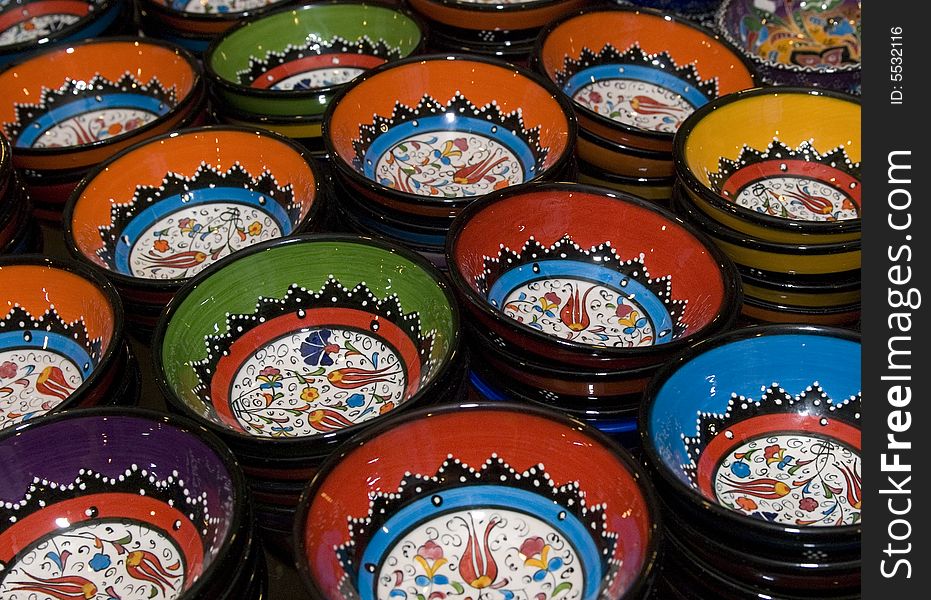 A shot of the colorful bowls hand-made from porcelain
