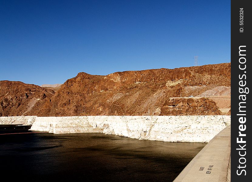 This is the top lake side of the Hoover Dam. See how far the water is down? This is just a few days after letting it out to artificially flood the bottom of the Colorado River. They are doing this to recreate what was long ago and redistribute banks of sand and sediment. Last time they did it it was unsuccessful.